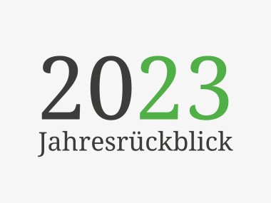 Grafik: Dunkler Hintergrund mit Text "Tschüss 2023! Jahresrückblick"