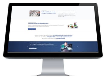 Pöppelmann GmbH & Co. KG - Relaunch of the corporate website based on TYPO3 Front view of monitor with website open
